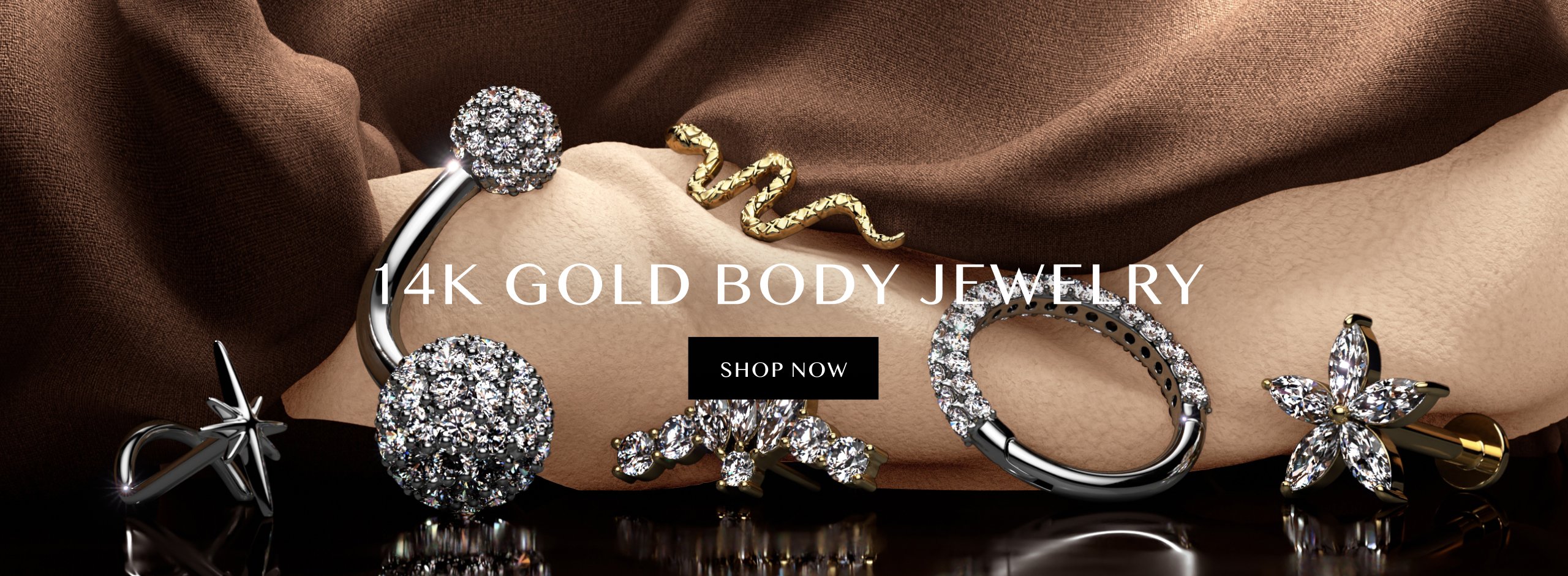 Luxurious body jewelry in solid 14K yellow or white gold.